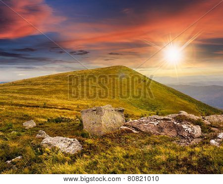 White Boulders On The Hillside At Sunset