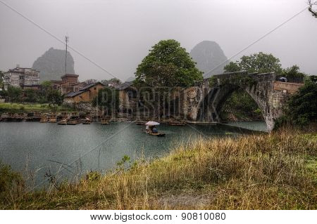 Dragon Bridge On Yulong River, Yangshuo, Guilin, Guangxi Province, China.