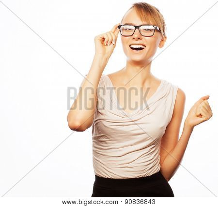 Business, finance and people concept: young business woman in glasses