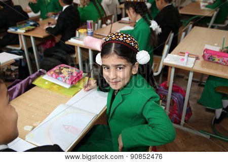 Ashgabad, Turkmenistan - November 4, 2014. Portrait Of An Unknown Schoolgirl In The Classroom.  Nove