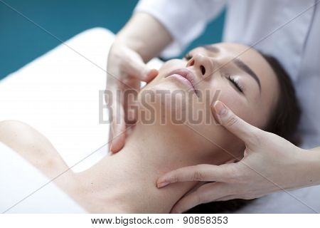 Young woman getting a massage in a spa