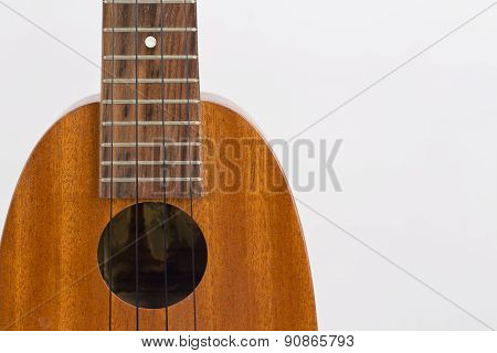 Ukulele Music Instrument On The White Background