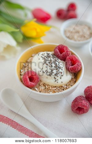 Joghurt with granola and fresh fruit for breakfast