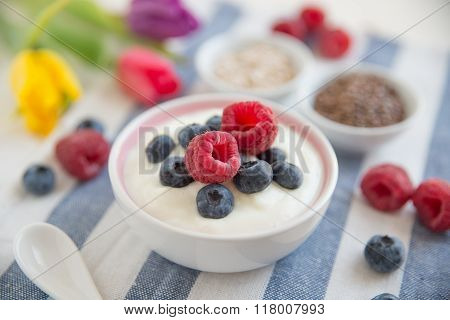 Joghurt with granola and fresh fruit for breakfast