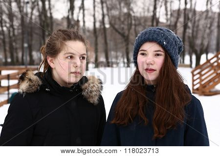 two teenage girls close up winter  portrait