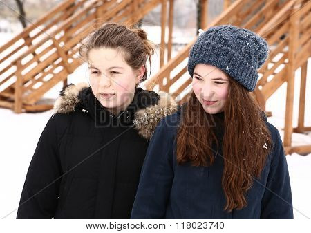 two teenage girls close up winter  portrait