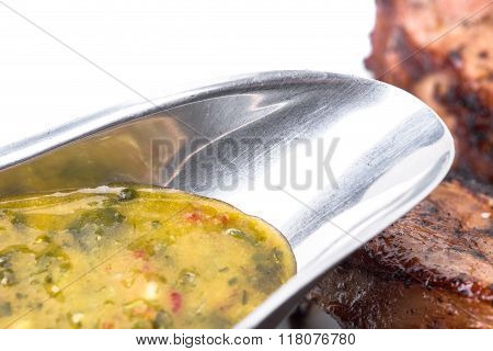 Hot herb sauce for griiled lamb fillet.