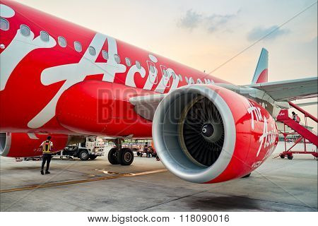 KUALA LUMPUR, MALAYSIA - MAY 02, 2014: close up shot of AirAsia aircraft engine. AirAsia Berhad is a Malaysian low-cost airline headquartered near Kuala Lumpur, Malaysia