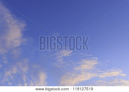 Fantastic Yellow Clouds Against Blue Sky