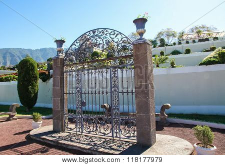 Wrought iron gate in the Jardines Marquesado de la Quinta Roja in La Orotava Tenerife Spain