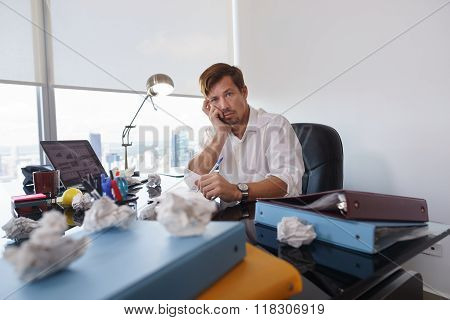 Portrait Sad Business Man Trying To Write Paper Letter