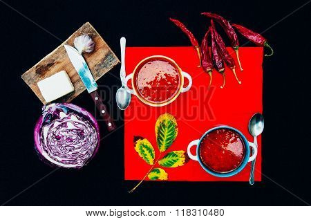 Traditional Ukrainian Russian vegetable borscht on the old wooden background. Ukrainian and russian