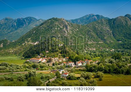 Aerial Montenegro landscape with Virpazar town and mountains of Skadar lake national park.