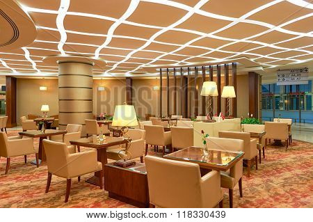 DUBAI, UAE - MARCH 31, 2015: interior of Emirates first class lounge. Emirates is the largest airline in the Middle East. It is an airline based in Dubai, United Arab Emirates.