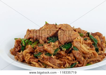 Stir fried flat noodle and pork with dark soy sauce