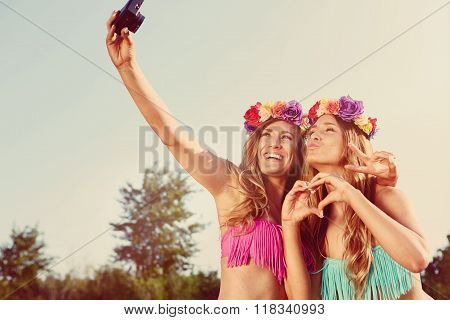 twins taking a photo