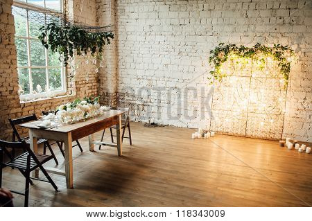 Wedding Room Decorated Loft Style With A Table And Accessories