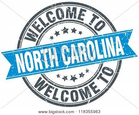 welcome to North Carolina blue round vintage stamp