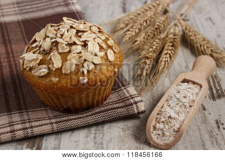 Fresh Muffin With Oatmeal, Rye Flour And Ears Of Rye Grain, Delicious Healthy Dessert
