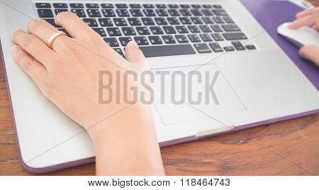 Hand Typing On Laptop Keyboard