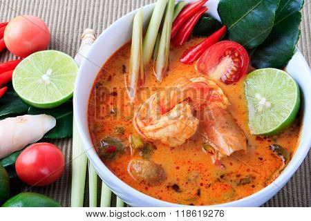 Thai Prawn Soup with Lemongrass (Tom Yum Goong) On Brown Cloth Background.