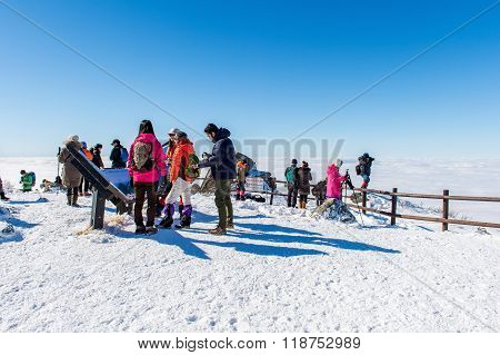 Tourists taking photos of the beautiful scenery around Deogyusan South Korea