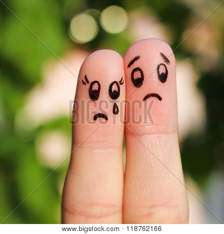 Finger art of displeased couple. Sad man soothe woman, she's crying.