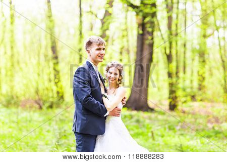 Happy bride and groom outdoor