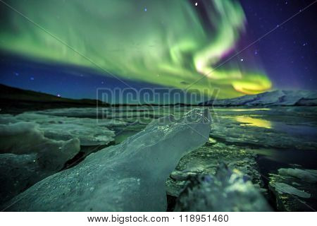 Auroral Over The Glacier Lagoon Jokulsarlon In Iceland.