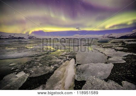 Auroral Over The Glacier Lagoon Jokulsarlon In Iceland.