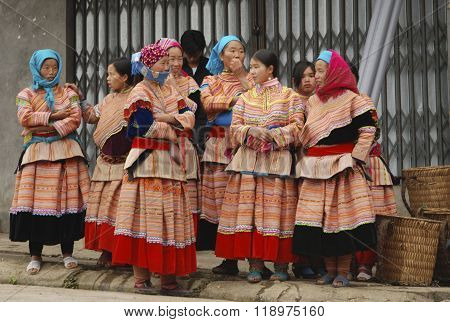 LAOCAI, VIETNAM, FEBRUARY 12, 2012: H'mong ethnic minority people in Bac Ha traditional market. H'mong is the 8th largest ethnic group in Vietnam.