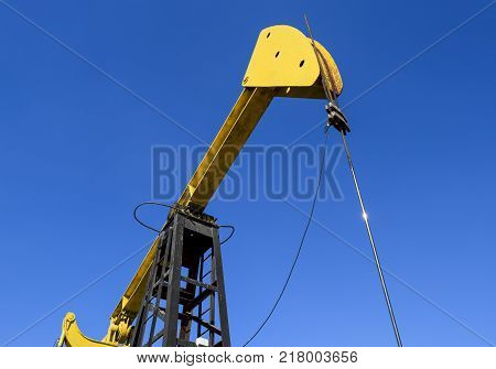 The pumping unit as the oil pump installed on a well. Equipment of oil fields.