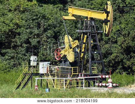 The pumping unit as the oil pump installed on a well. Equipment of oil fields.