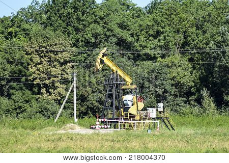 The pumping unit as the oil pump installed on a well. Equipment of oil fields.