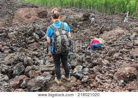 Kamchatka Peninsula, Russia - August 20, 2016: Tourists on the North Breakthrough Great Tolbachik Fissure Eruption in the Kamchatka