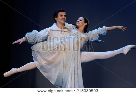 ST. PETERSBURG, RUSSIA - NOVEMBER 16, 2017: Soloists of Novosibirsk Opera and Ballet Theater Anna Germizeeva and Nikolay Maltsev perform during gala concert of great choreographer Oleg Vinogradov