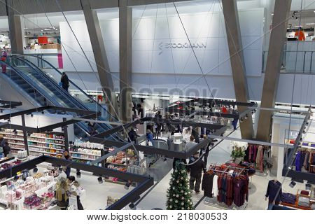 HELSINKI, FINLAND - DECEMBER 9, 2017: People on the Christmas market of Stockmann department store in Itis shopping center. Since 2001, this mall is the largest shopping centre in the Nordic countries