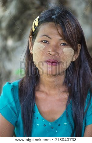 Mandalay Myanmar - Sep 03 : Portrait Of Burmese Girl With Thanaka On Face On Mandalay Myanmar On Sep