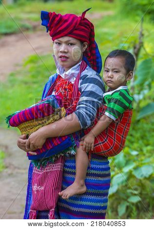 Inle Lake Myanmar - Sep 07 : Intha Tribe Woman With Her Child In Inle Lake Myanmar On September 07 2