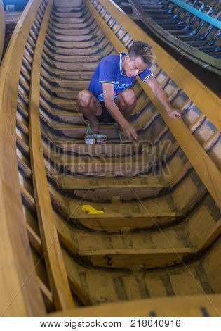 Inle Lake Myanmar - Sep 07 : A Burmese Man Building A Boat In Inle Lake Myanmar On September 07 2017