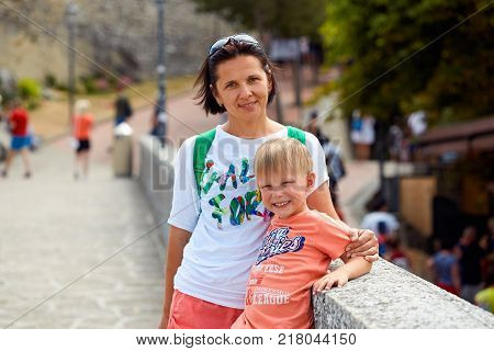 San marino San Marino - July 10 2017: Tourists mother and son walk the streets of San Marino