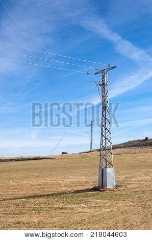 Electricity pylon in an agricultural landscape in Toledo Province, Spain