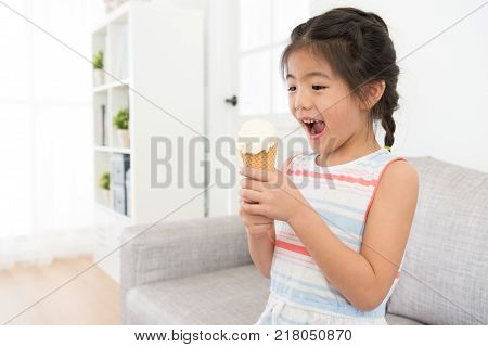 Happy Cheerful Little Girl Kid Holding Ice Cream