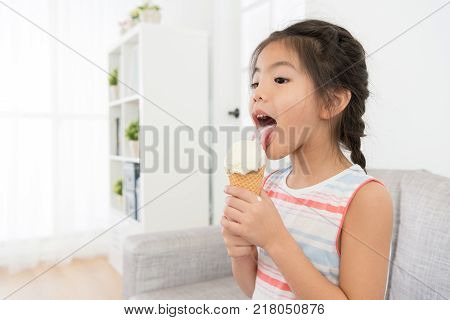 Happy Cheerful Little Girl Kid Holding Ice Cream