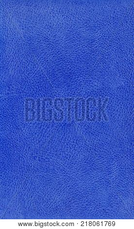 Grunge blue leather background textured with deep graining patterns