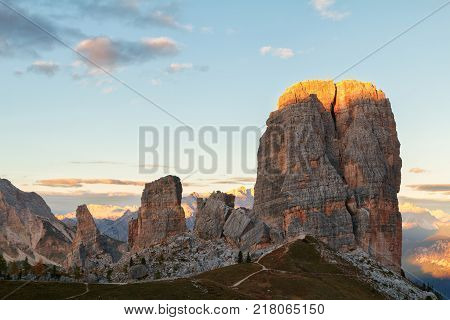 Cinque Torri mountain beautiful autumn colors in Dolomites mountain on the background Tofana peak in valley Cortina D'Ampezzo city at Italy Europe