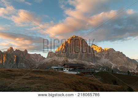 Cinque Torri mountain beautiful autumn colors in Dolomites mountain on the background Tofana peak in valley Cortina D'Ampezzo city at Italy Europe