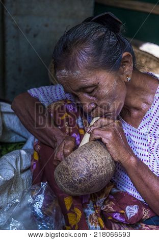 Bagan Myanmar- Sep 04 : Woman Smoking A Cheroot Cigar In Market In Bagan Myanmar On September 04 201
