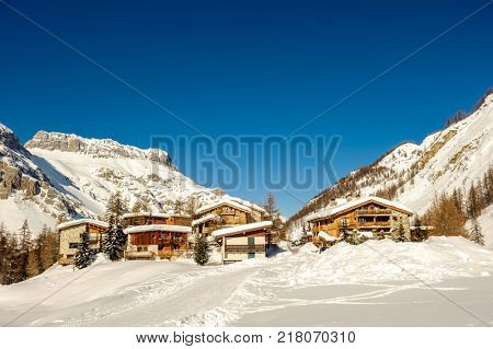 Alpine winter mountain landscape. French Alps covered with snow in sunny day. Val-d'Isere, France
