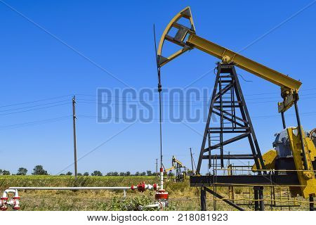The pumping unit as the oil pump installed on a well. Equipment of oil fields.